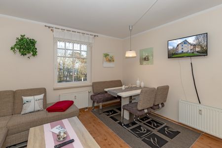 Ostseewelle Ostseewelle 21 Kühlungsborn - Wohn-Essbereich mit Couch