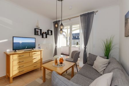 Apartment-Residenz Ostseestrand Apartment-Residenz Ostseestrand 21 Kühlungsborn - Wohn-Essbereich mit Couch