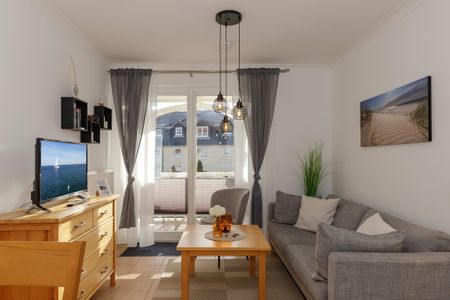 Apartment-Residenz Ostseestrand Apartment-Residenz Ostseestrand 21 Kühlungsborn - Wohn-Essbereich mit Couch