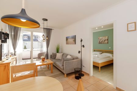 Apartment-Residenz Ostseestrand Apartment-Residenz Ostseestrand 21 Kühlungsborn - Wohn-Essbereich mit Couch