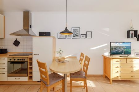 Apartment-Residenz Ostseestrand Apartment-Residenz Ostseestrand 21 Kühlungsborn - Wohn-Essbereich mit Couch