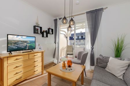 Apartment-Residenz Ostseestrand Apartment-Residenz Ostseestrand 21 Kühlungsborn - Wohn-Essbereich mit Couch