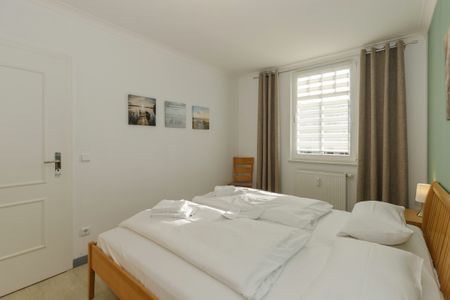 Apartment-Residenz Ostseestrand Apartment-Residenz Ostseestrand 21 Kühlungsborn - Schlafzimmer mit Doppelbett
