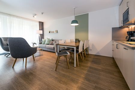 Apartmentvilla Anna See Apartmentvilla Anna See 1-15 Langeoog - Wohn-Essbereich mit Couch