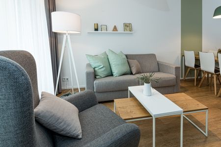 Apartmentvilla Anna See Apartmentvilla Anna See 1-15 Langeoog - Wohn-Essbereich mit Couch