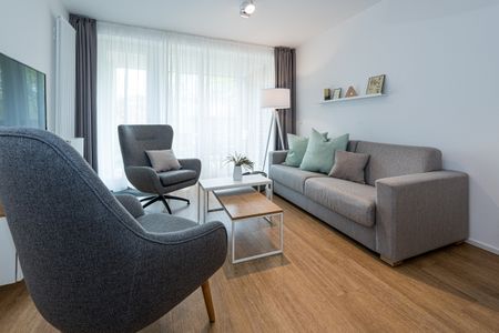 Apartmentvilla Anna See Apartmentvilla Anna See 1-15 Langeoog - Wohn-Essbereich mit Couch