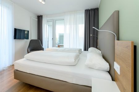 Apartmentvilla Anna See Apartmentvilla Anna See 1-15 Langeoog - Schlafzimmer mit Doppelbett