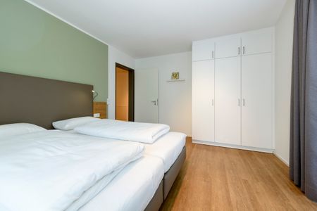 Apartmentvilla Anna See Apartmentvilla Anna See 1-15 Langeoog - Schlafzimmer mit Doppelbett