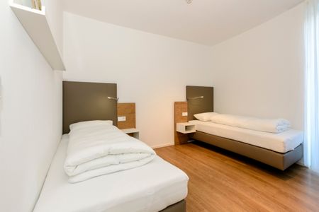 Apartmentvilla Anna See Apartmentvilla Anna See 1-15 Langeoog - Schlafzimmer mit zwei Einzelbetten