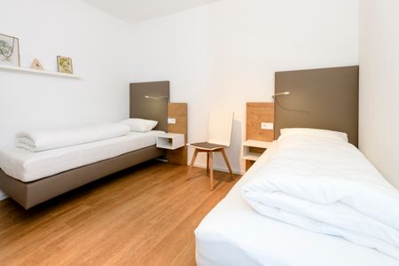 Apartmentvilla Anna See Apartmentvilla Anna See 1-15 Langeoog - Schlafzimmer mit zwei Einzelbetten