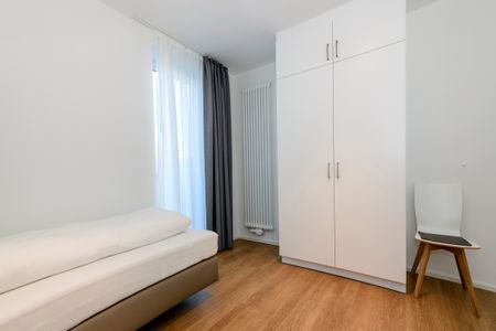 Apartmentvilla Anna See Apartmentvilla Anna See 1-15 Langeoog - Schlafzimmer mit zwei Einzelbetten