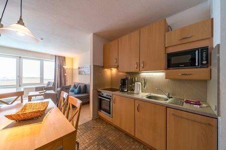 Hus Strandkieker Hus Strandkieker 09 Schillig - Wohn-Essbereich mit Küchenzeile