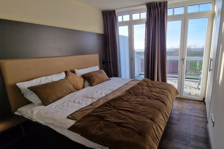 Resort Deichgraf Resort Deichgraf 31-18 Wremen - Schlafzimmer mit Doppelbett