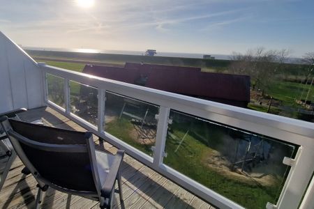 Resort Deichgraf Resort Deichgraf 31-18 Wremen - Balkon mit Gartenmöbeln