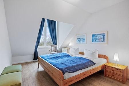 Sünnslag Sünnslag 23 Boltenhagen - Schlafzimmer mit Doppelbett