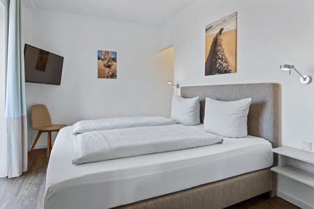 Ohlerich Speicher Ohlerich Speicher 4-26 Wismar - Schlafzimmer mit Doppelbett