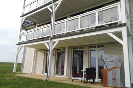 Resort Deichgraf Resort Deichgraf 31-03 Wremen - Terrasse mit Gartenmöbeln