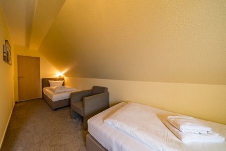Hus Strandkieker Hus Strandkieker 04 Schillig - Schlafzimmer mit zwei Einzelbetten