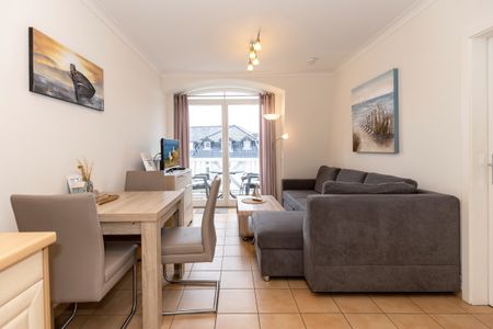 Apartment-Residenz Ostseestrand Apartment-Residenz Ostseestrand 35 Kühlungsborn - Wohn-Essbereich mit Couch