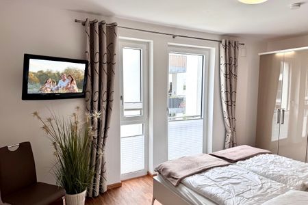 DünenResort Binz DünenResort Binz 111 Rügen - Schlafzimmer mit Doppelbett und Flatscreen TV - gbmv0-01 - Großenbrode