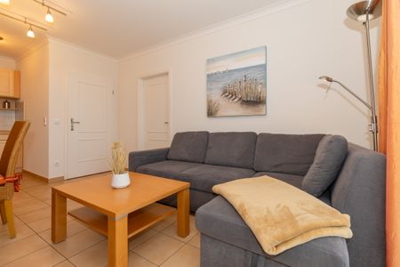Apartment-Residenz Ostseestrand Apartment-Residenz Ostseestrand 26 Kühlungsborn - Wohn-Essbereich mit Couch