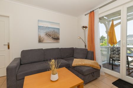 Apartment-Residenz Ostseestrand Apartment-Residenz Ostseestrand 26 Kühlungsborn - Wohn-Essbereich mit Couch