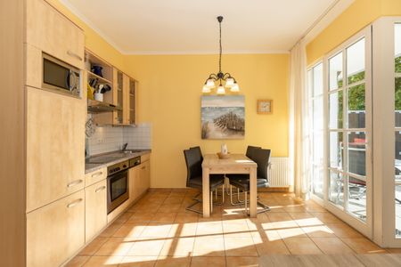 Apartmenthaus Atlantik Apartmenthaus Atlantik 006 Kühlungsborn - Wohn-Essbereich mit Küchenzeile und Esstisch
