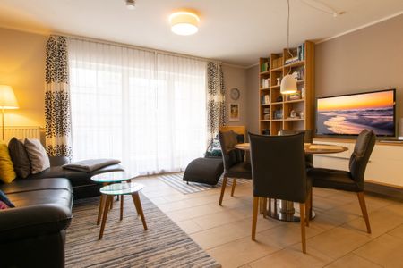 Inselstrand Inselstrand 119 Usedom - Wohn-Essbereich mit Couch und Esstisch