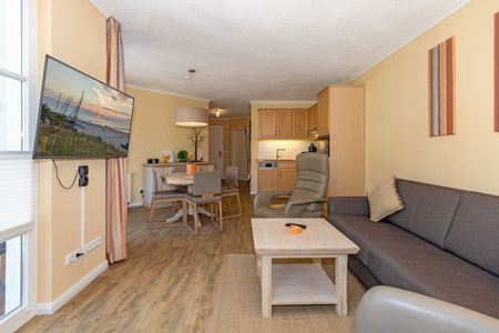 Apartmenthaus Atlantik Apartmenthaus Atlantik 102 Kühlungsborn - Wohn-Essbereich mit Couch