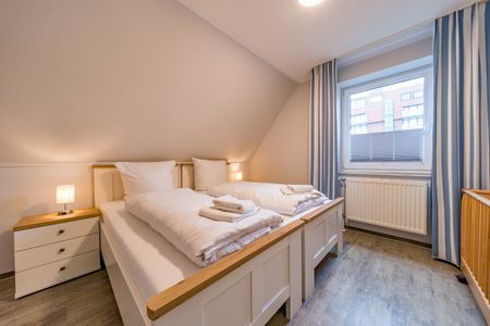 Hus Inselkieker Hus Inselkieker 218  Schillig - Schlafzimmer mit Doppelbett