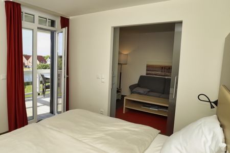 Resort Deichgraf Resort Deichgraf 31-12 Wremen - Schlafzimmer mit Doppelbett