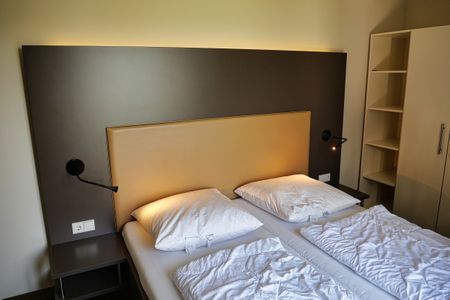 Resort Deichgraf Resort Deichgraf 31-12 Wremen - Schlafzimmer mit Doppelbett
