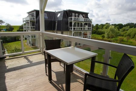 Resort Deichgraf Resort Deichgraf 31-12 Wremen - Balkon mit Gartenmöbeln