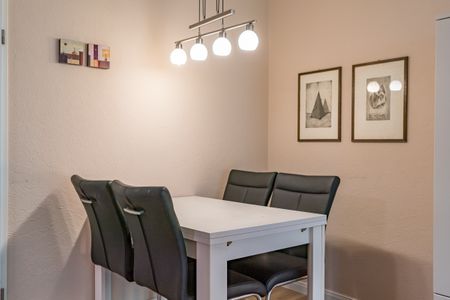 Haus Boje Haus Boje 3 Schillig - Wohn-Essbereich mit Esstisch und Sitzgelegenheit