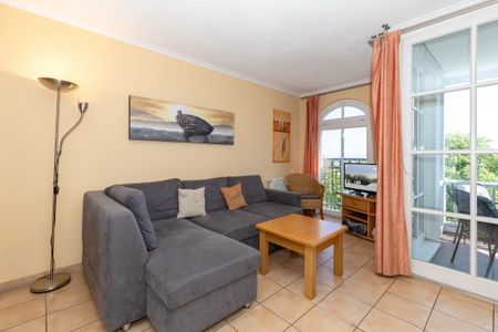 Apartmenthaus Atlantik Apartmenthaus Atlantik 318 Kühlungsborn - Wohn-Essbereich mit Couch