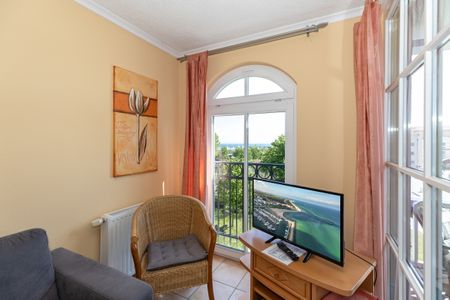 Apartmenthaus Atlantik Apartmenthaus Atlantik 318 Kühlungsborn - Wohn-Essbereich mit Flatscreen-TV