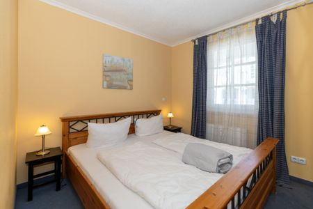 Apartmenthaus Atlantik Apartmenthaus Atlantik 318 Kühlungsborn - Schlafzimmer mit Doppelbett