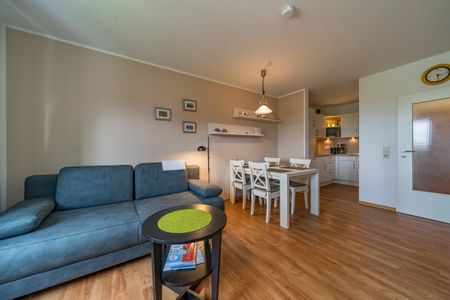 Hus Jadekieker Hus Jadekieker 08 Schillig - Wohn-Essbereich mit Couch