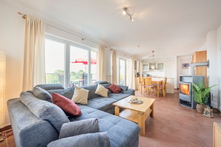 NordseeResort Friesland NordseeResort Friesland 52-4-S Schillig - Wohn-Essbereich mit Couch