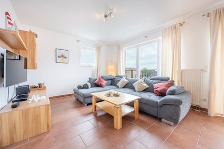 NordseeResort Friesland NordseeResort Friesland 52-4-S Schillig - Wohn-Essbereich mit Couch