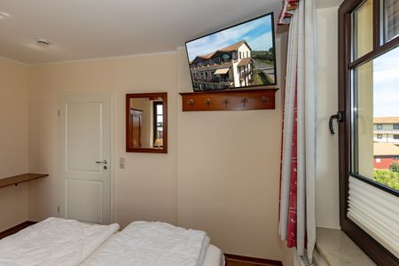 Urlaubsräume am Meer Urlaubsräume am Meer 4-9 Kühlungsborn - Schlafzimmer mit Doppelbett
