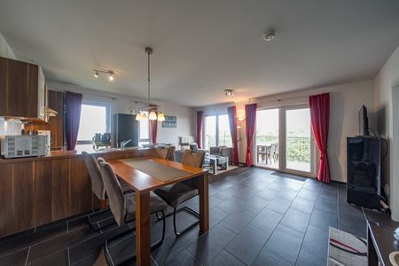 NordseeResort Friesland NordseeResort Friesland 51-2-N Schillig - Wohn-Essbereich mit Couch