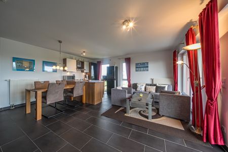 NordseeResort Friesland NordseeResort Friesland 51-2-N Schillig - Wohn-Essbereich mit Esstisch und Sitzgelegenheit