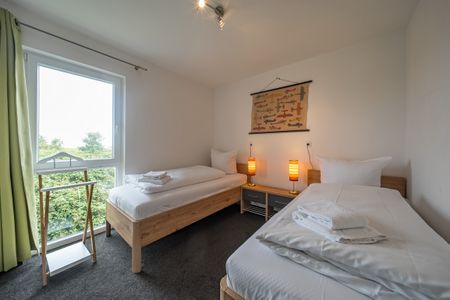 NordseeResort Friesland NordseeResort Friesland 51-2-N Schillig - Schlafzimmer mit zwei Einzelbetten