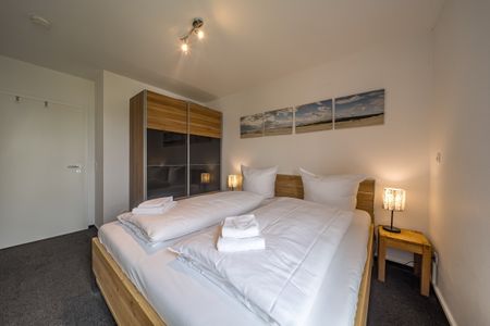 NordseeResort Friesland NordseeResort Friesland 51-2-N Schillig - Schlafzimmer mit Doppelbett