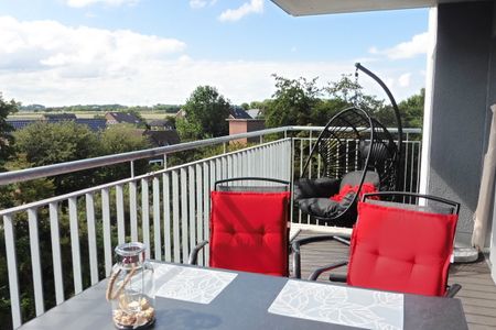 NordseeResort Friesland Nordseeresort Friesland 50-3-s Schillig - Balkon mit Gartenmöbeln