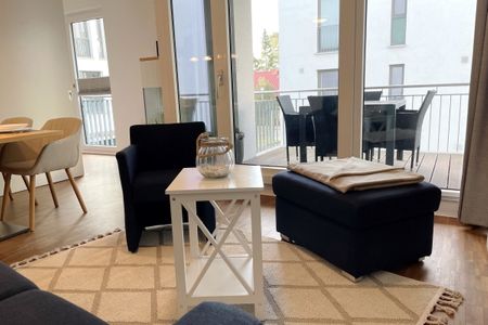DünenResort Binz DünenResort Binz 419 Rügen - Wohn-Essbereich mit Couch