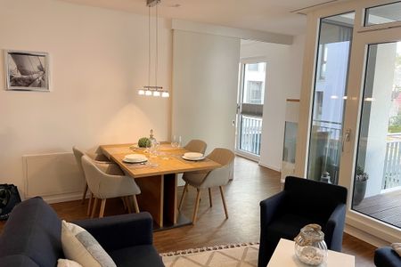 DünenResort Binz DünenResort Binz 419 Rügen - Wohn-Essbereich mit Esstisch und Sitzgelegenheit