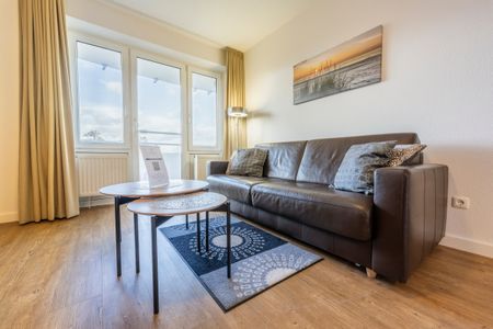Hus Inselkieker Hus Inselkieker 107 Schillig - Wohn-Essbereich mit Couch