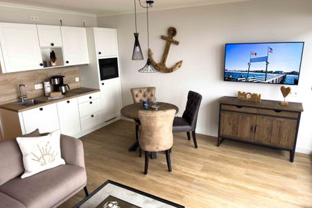 Apartmenthaus Atlantik Apartmenthaus Atlantik 311 Kühlungsborn - Wohn-Essbereich mit Küchenzeile und Esstisch